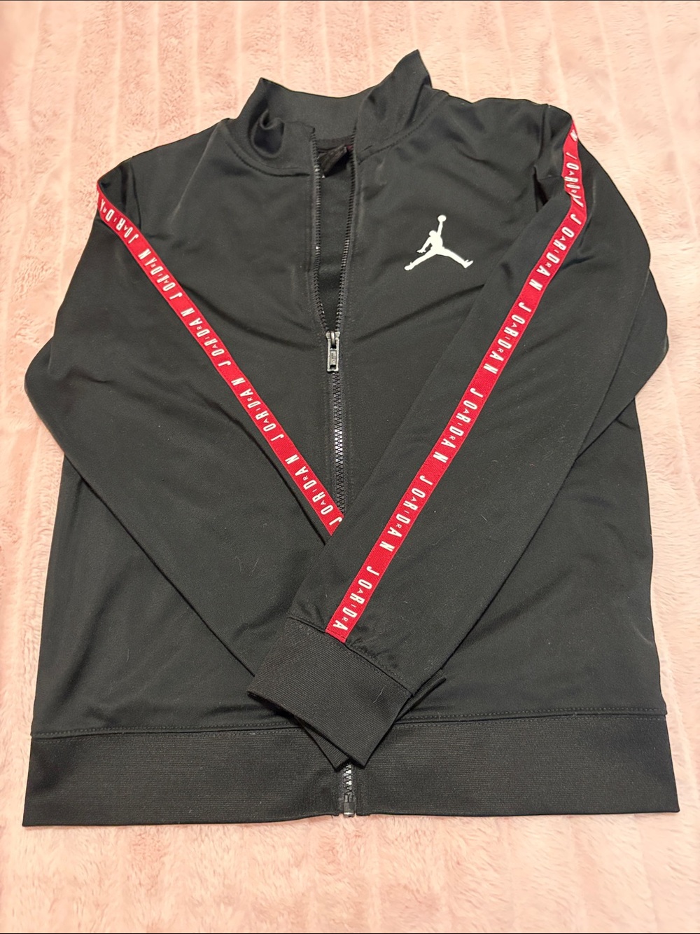 Jordan Black Track Jacket with Red Sleeve Tape and White Jumpman